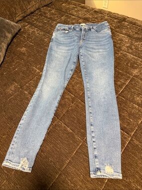 Good American Light Blue Skinny Jeans with Hem Distress